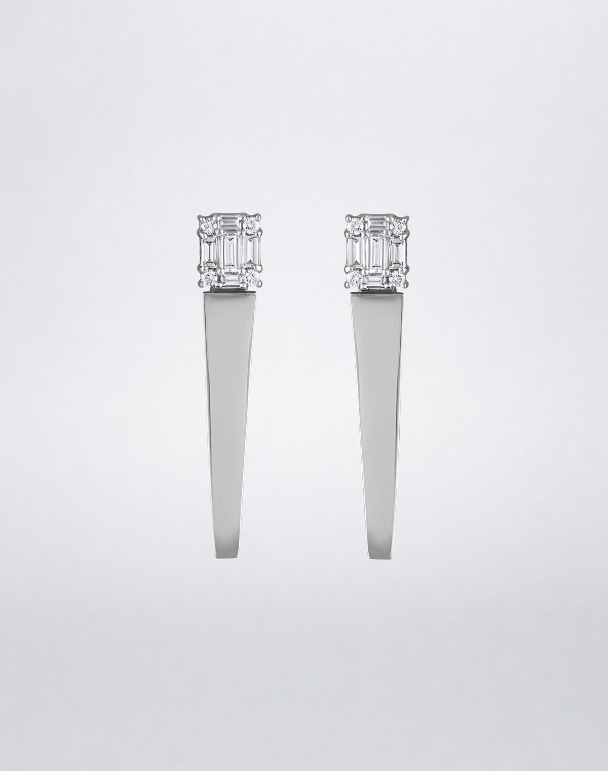 Mindi Mond New York Clarity³ Polished Gold Icicle Earrings in 18K white gold, a nine-stone diamond formation above a sleek tapered high-polish drop