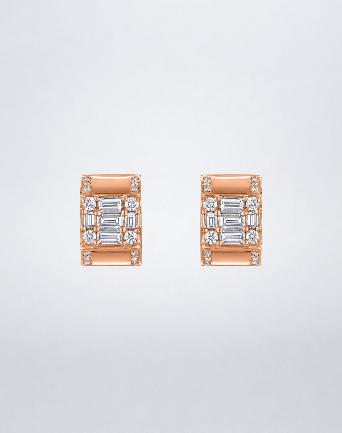 Mindi Mond New York Clarity³ Lovers Huggie Earrings in 18K rose gold, a nine-stone diamond formation on a wide polished huggie with pavé edges