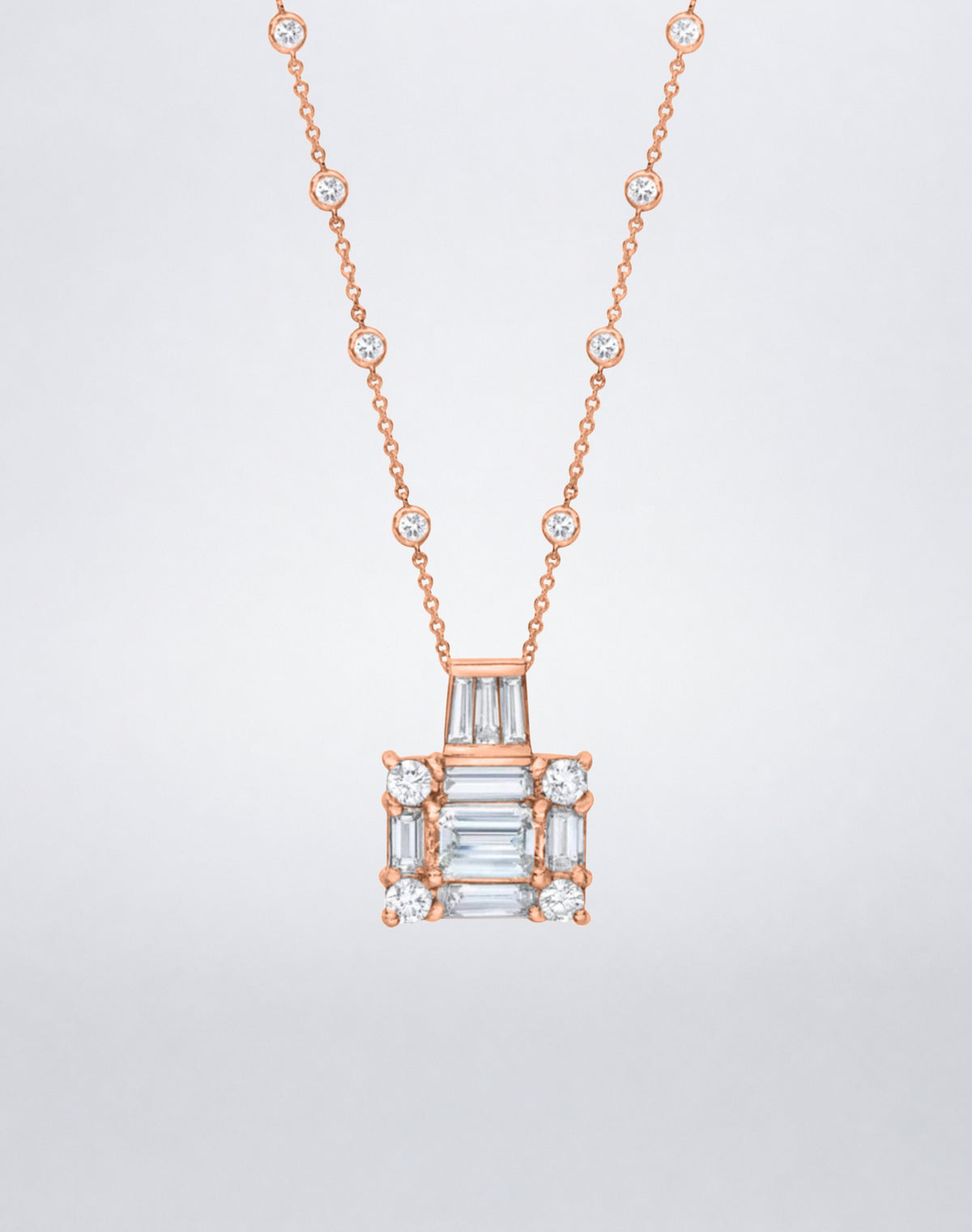 A Mindi Mond New York statement necklace with the Clarity³ diamond cube, baguette and round brilliants, on a diamond-set 18k rose gold chain, close