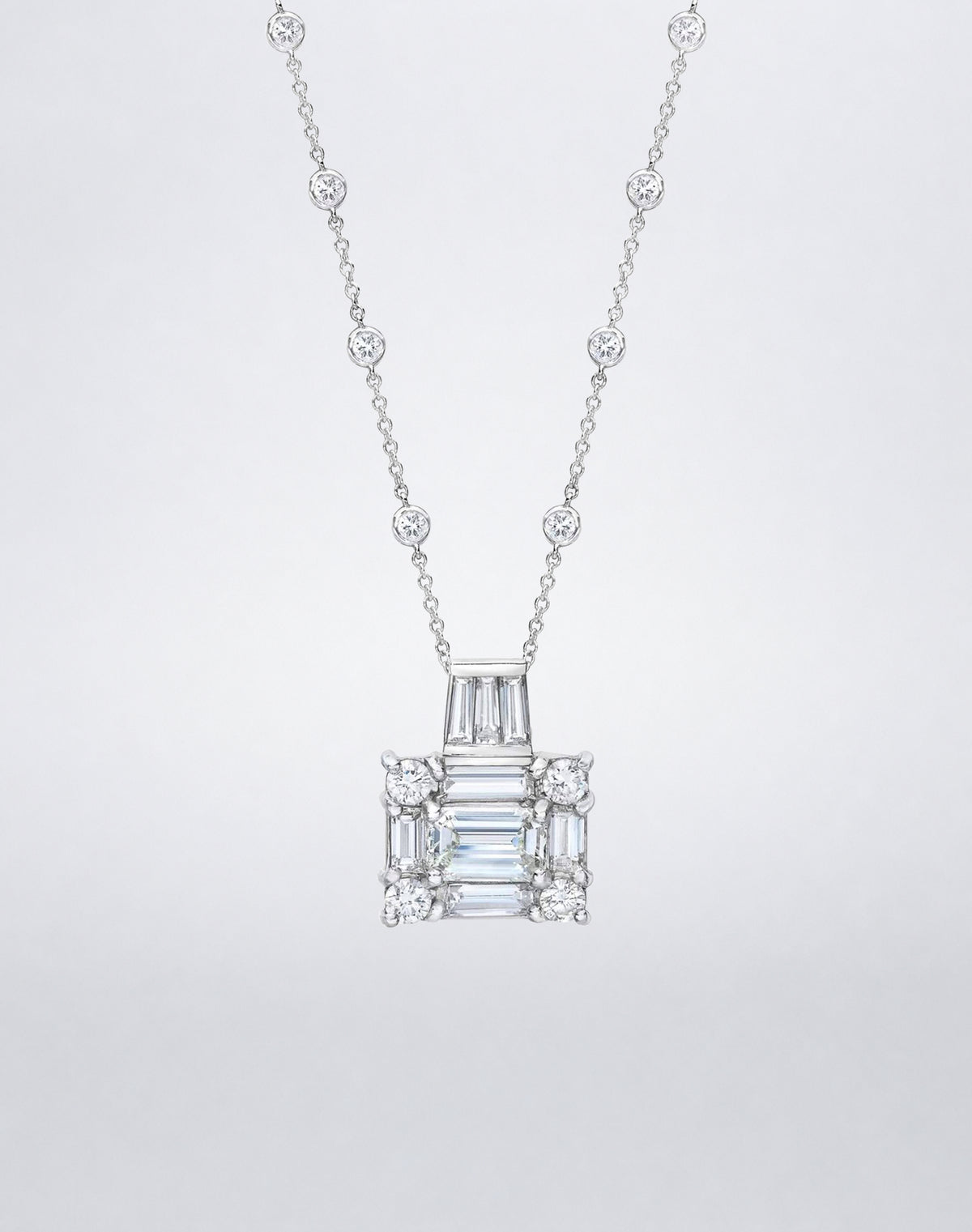 A Mindi Mond New York statement necklace with the Clarity³ diamond cube, baguette and round brilliants, on a diamond-set 18k white gold chain, close
