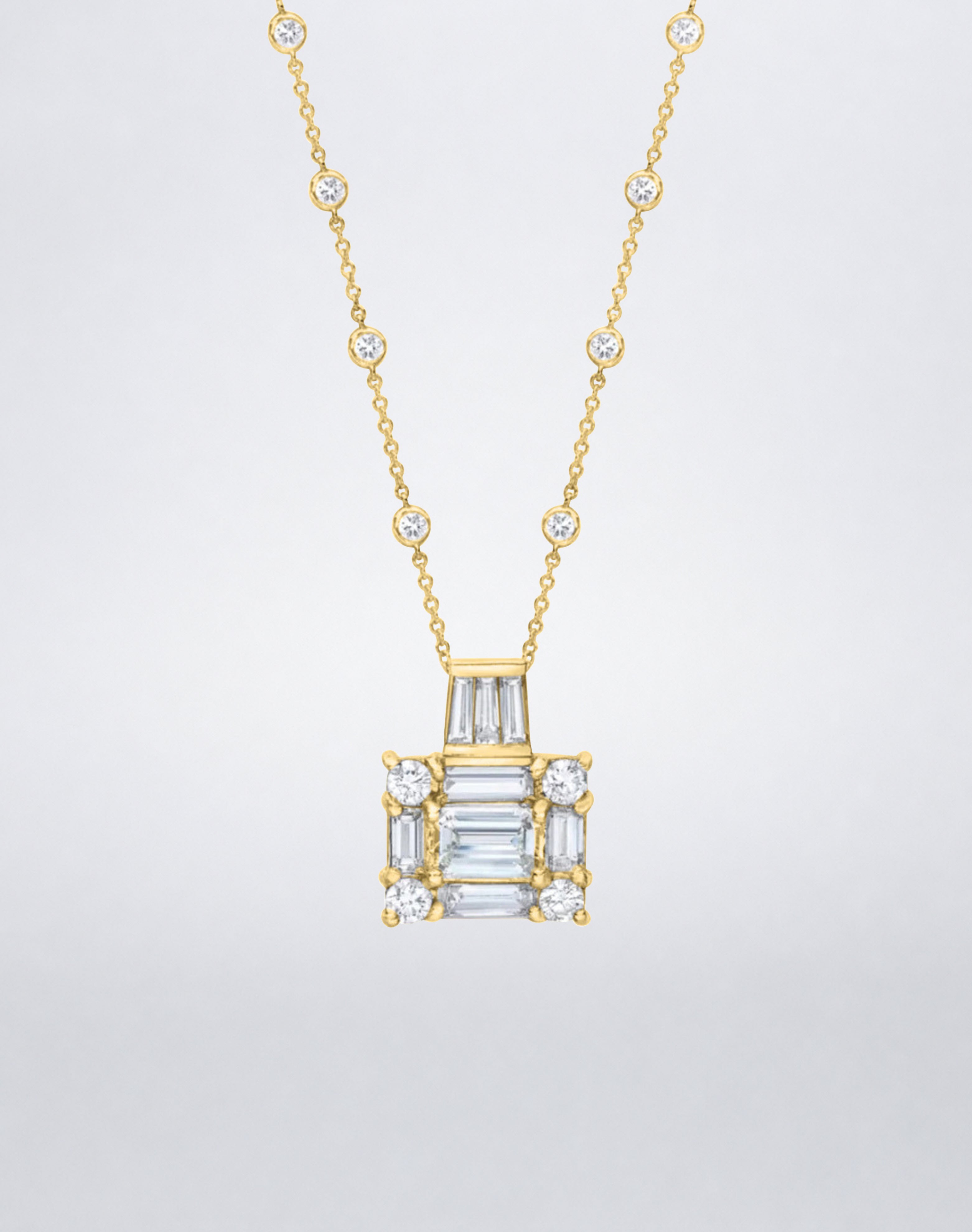 A Mindi Mond New York statement necklace with the Clarity³ diamond cube, baguette and round brilliants, on a diamond-set 18k yellow gold chain, close