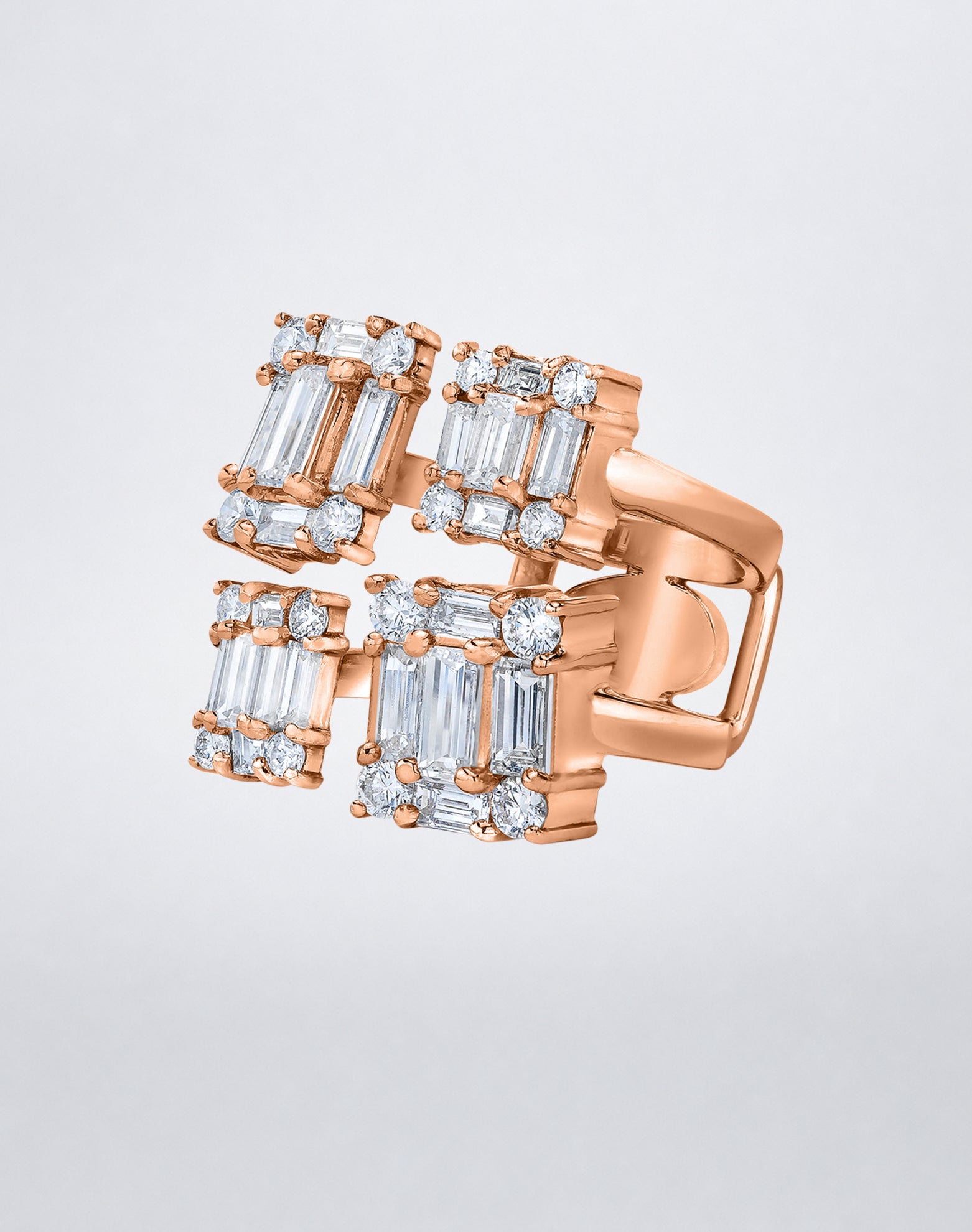 CLARITY³ Quad Ring in 18K rose gold featuring four rectangular clusters of baguette-cut and round diamonds, side view