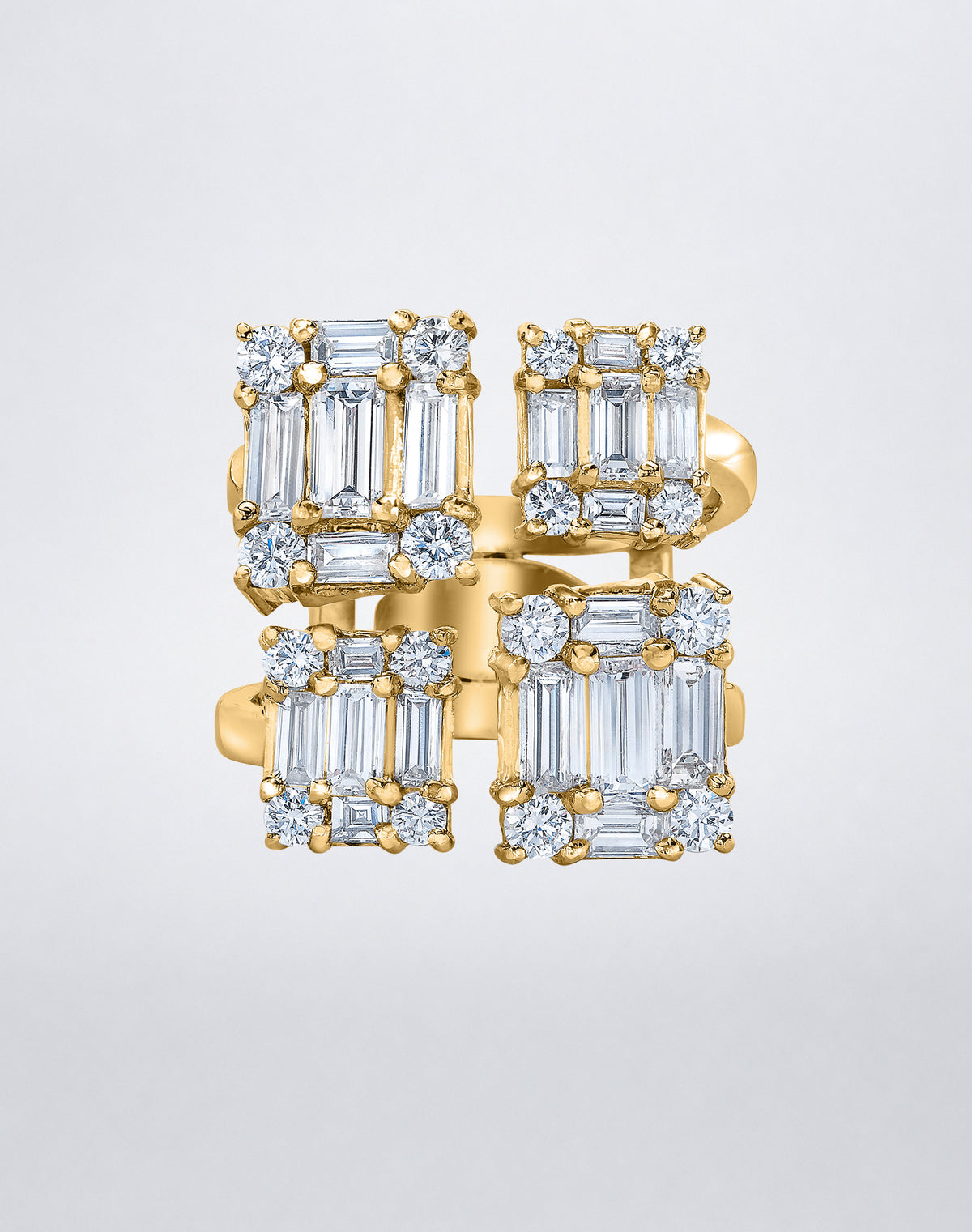 CLARITY³ Quad Ring in 18K yellow gold featuring four rectangular clusters of baguette-cut and round diamonds, front view