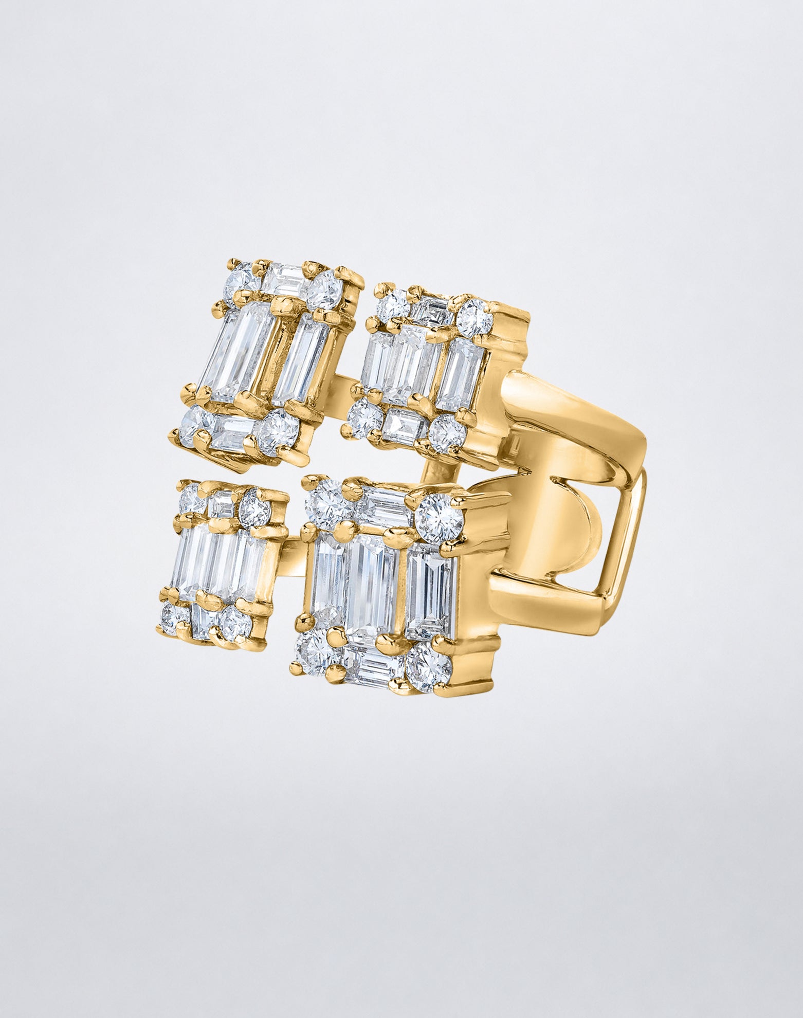 CLARITY³ Quad Ring in 18K yellow gold featuring four rectangular clusters of baguette-cut and round diamonds, side view