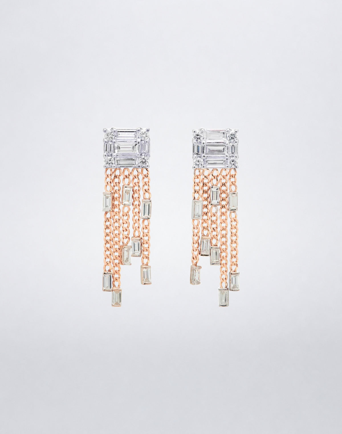 Mindi Mond New York Clarity³ Tassel Earrings in 18K rose gold, a diamond formation trailing five chains tipped with baguette diamonds