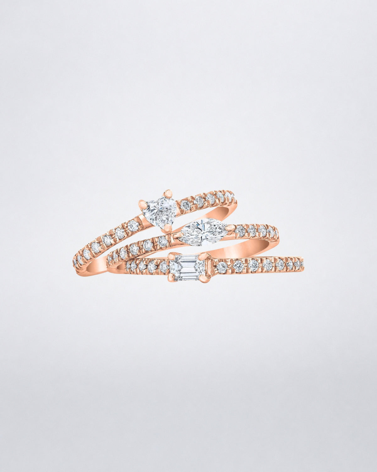 Mindi Mond New York Fancy Cut Diamond Stackable Rings in 18K rose gold, three slim pavé bands with heart, marquise and emerald-cut diamonds stacked together