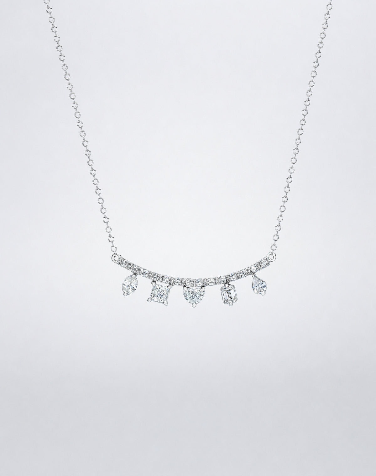 Mindi Mond New York Fancy Cut Necklace in 18K white gold, five fancy-cut diamonds suspended from a curved pavé bar on a fine chain