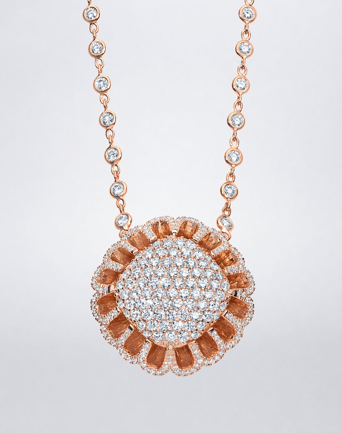 Detail of Mindi Mond New York Floating Hues All Diamond Necklace with pavé diamond medallion in signature elliptical setting in 18K rose gold