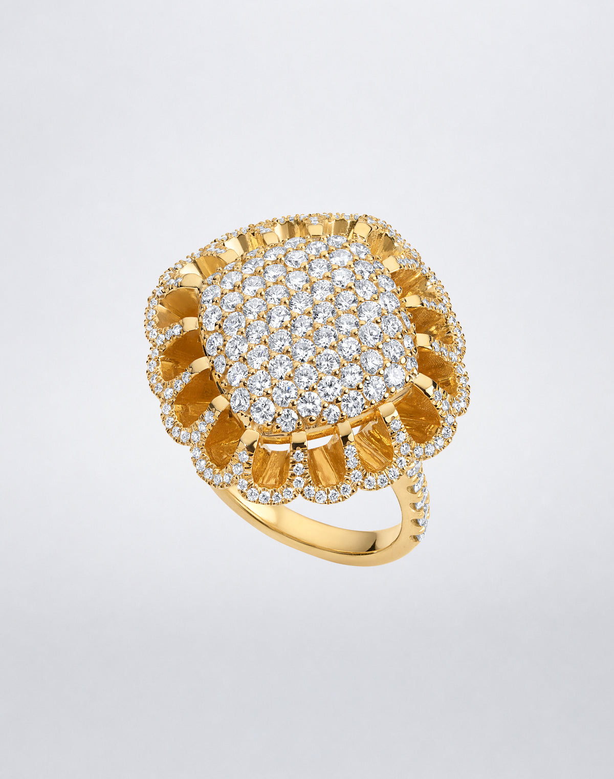 Mindi Mond New York FLOATING HUES All Diamond Ring in 18K yellow gold, angled view showcasing diamonds in the iconic elliptical setting.