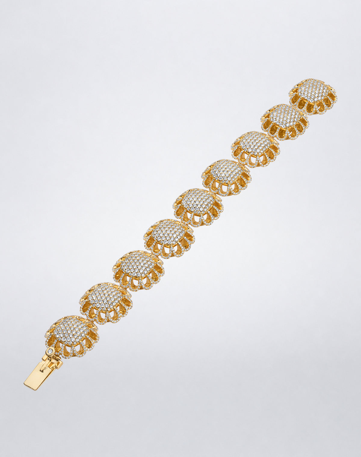 Full view of Mindi Mond New York Floating Hues All Diamond Bracelet with round brilliant diamonds in 18K yellow gold