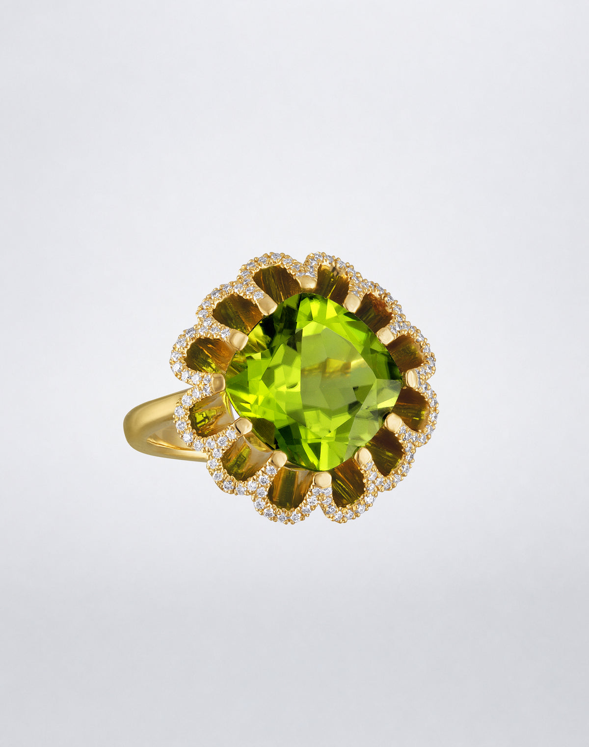 Mindi Mond New York FLOATING HUES Mini Peridot and Diamond Ring in 18K yellow gold, front view featuring a cushion-cut peridot in the iconic elliptical setting.