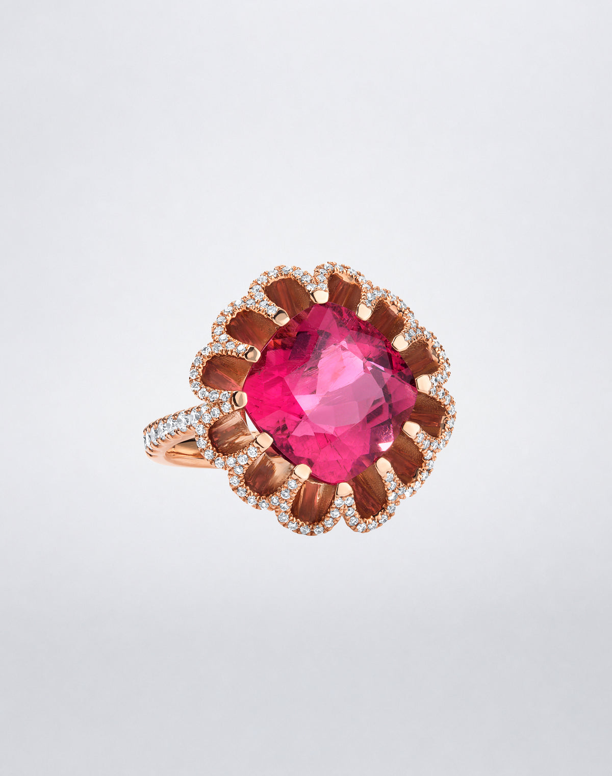 Mindi Mond New York FLOATING HUES Mini Pink Tourmaline and Diamond Ring in 18K rose gold, front view showcasing a cushion-cut pink tourmaline framed by diamonds in the iconic elliptical setting.