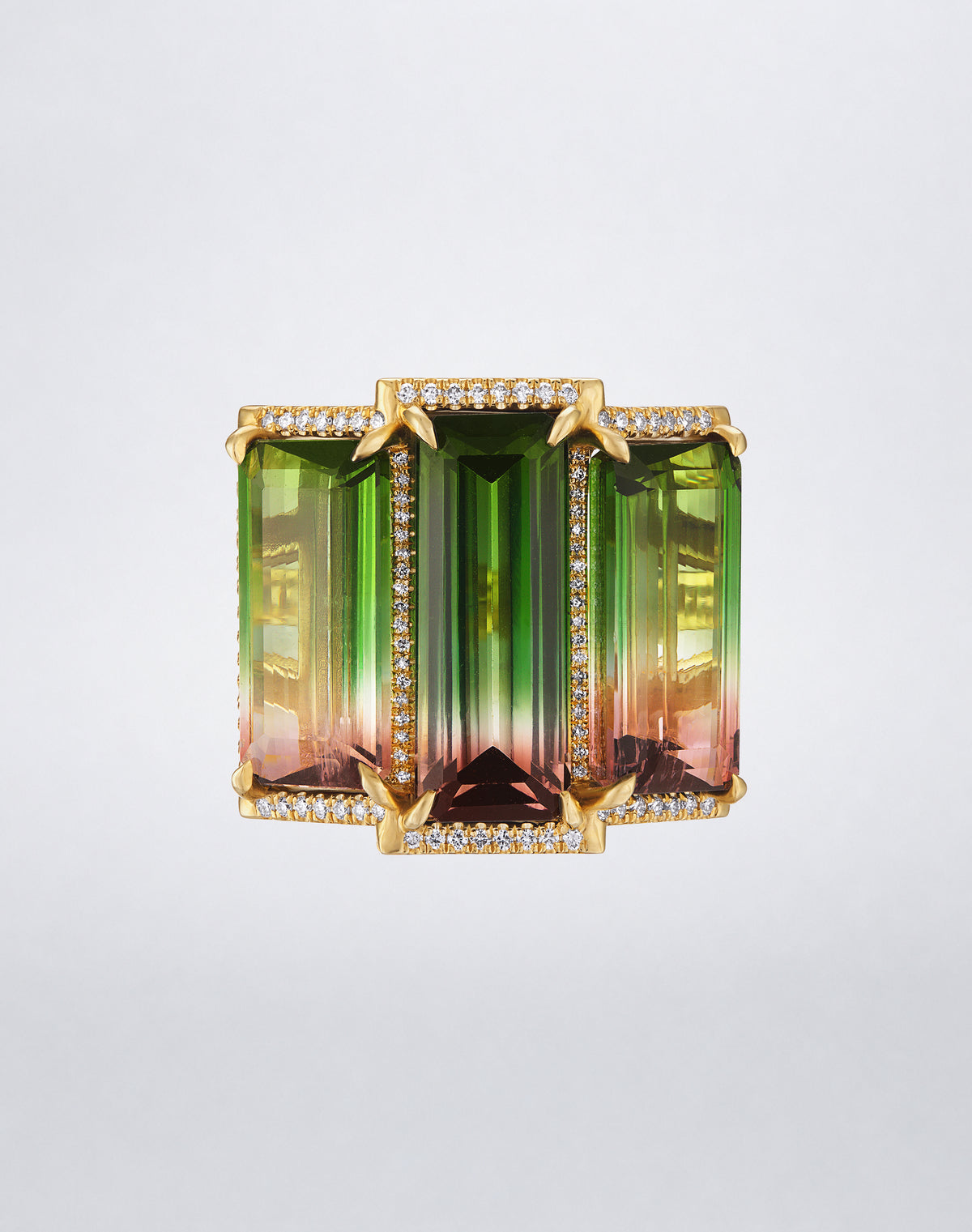 Front view of the Mindi Mond New York Bi-Color Watermelon Tourmaline Ring featuring three elongated green and pink tourmalines framed with diamonds in 18K yellow gold.