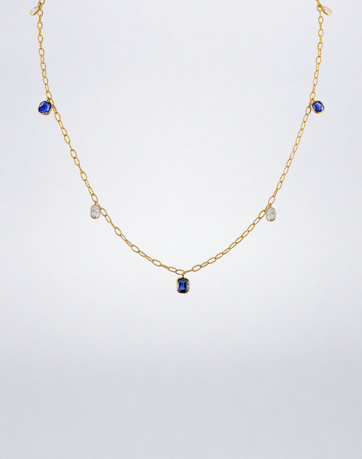 Mindi Mond New York ICONS Ceylon Sapphire and Diamond Tinsel Drop Chain Necklace in 18K yellow gold, 18-inch front view with sapphire and diamond drops.