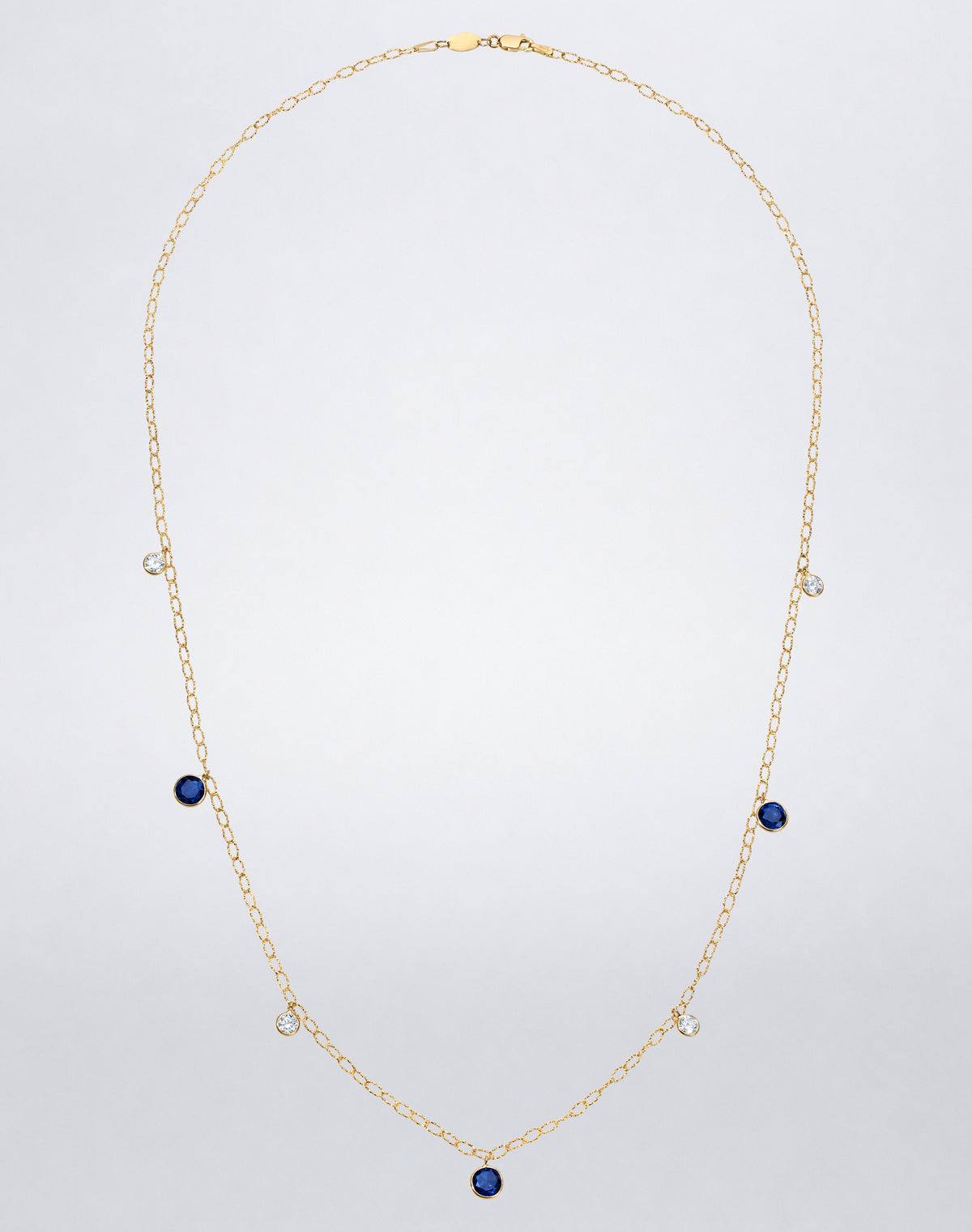 Mindi Mond New York ICONS Ceylon Sapphire and Diamond Tinsel Drop Chain Necklace in 18K yellow gold, 24-inch front view with sapphire and diamond drops.