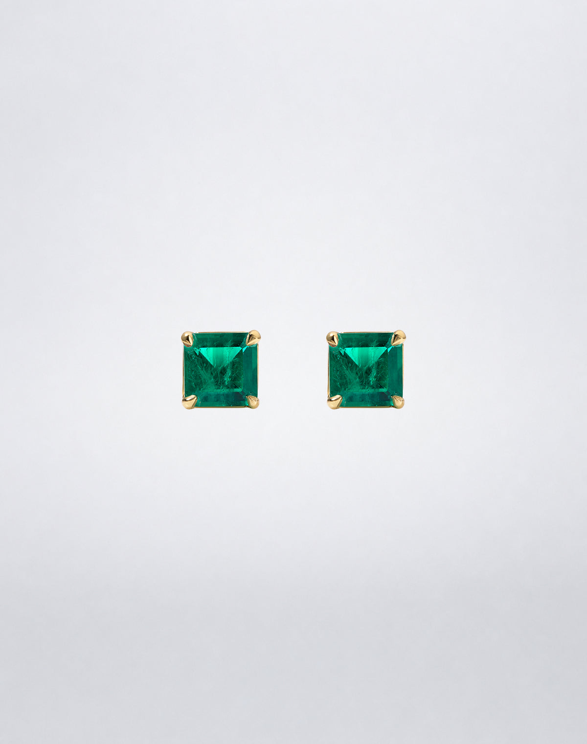 Mindi Mond New York ICONS Colombian Emerald Stud Earrings in 18K yellow gold, front view featuring square emerald-cut Colombian emeralds.