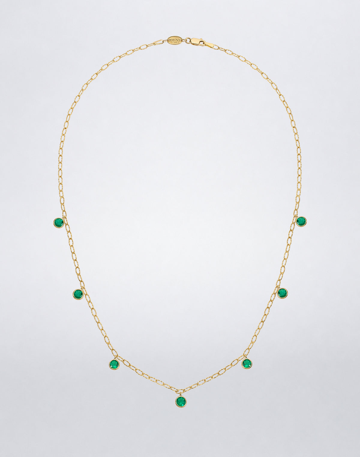 Mindi Mond New York ICONS Colombian Emerald Drop Tinsel Chain Necklace in 18K yellow gold, 18-inch front view with bezel-set emerald drops.