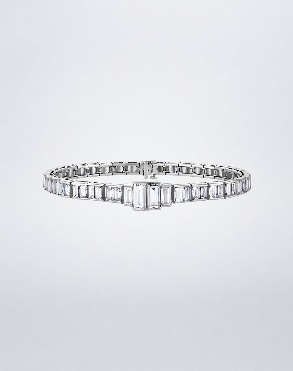 Mindi Mond New York ICONS Diamond Lovers Line Bracelet in platinum, front view showcasing emerald-cut diamonds with graduated center stones.