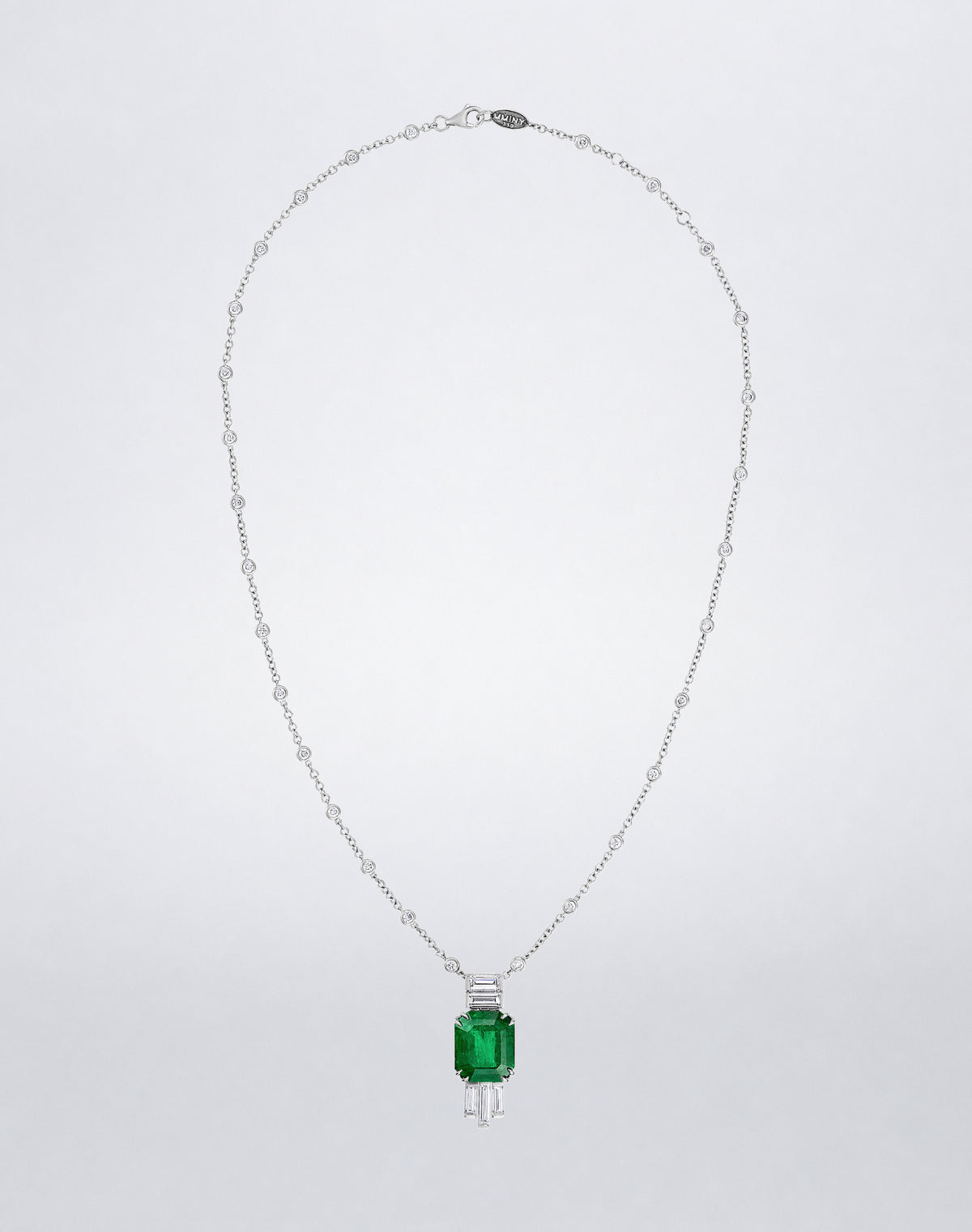Mindi Mond New York Emerald and Diamond Joaillerie Pendant Necklace with an emerald-cut emerald and baguette diamonds in 18K white gold.