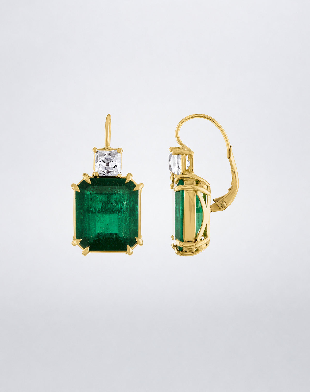 Side view of Mindi Mond New York ICONS Emerald and French-Cut Diamond Sheri Earrings in 18K yellow gold, highlighting the emeralds, French-cut diamonds and leverback setting.