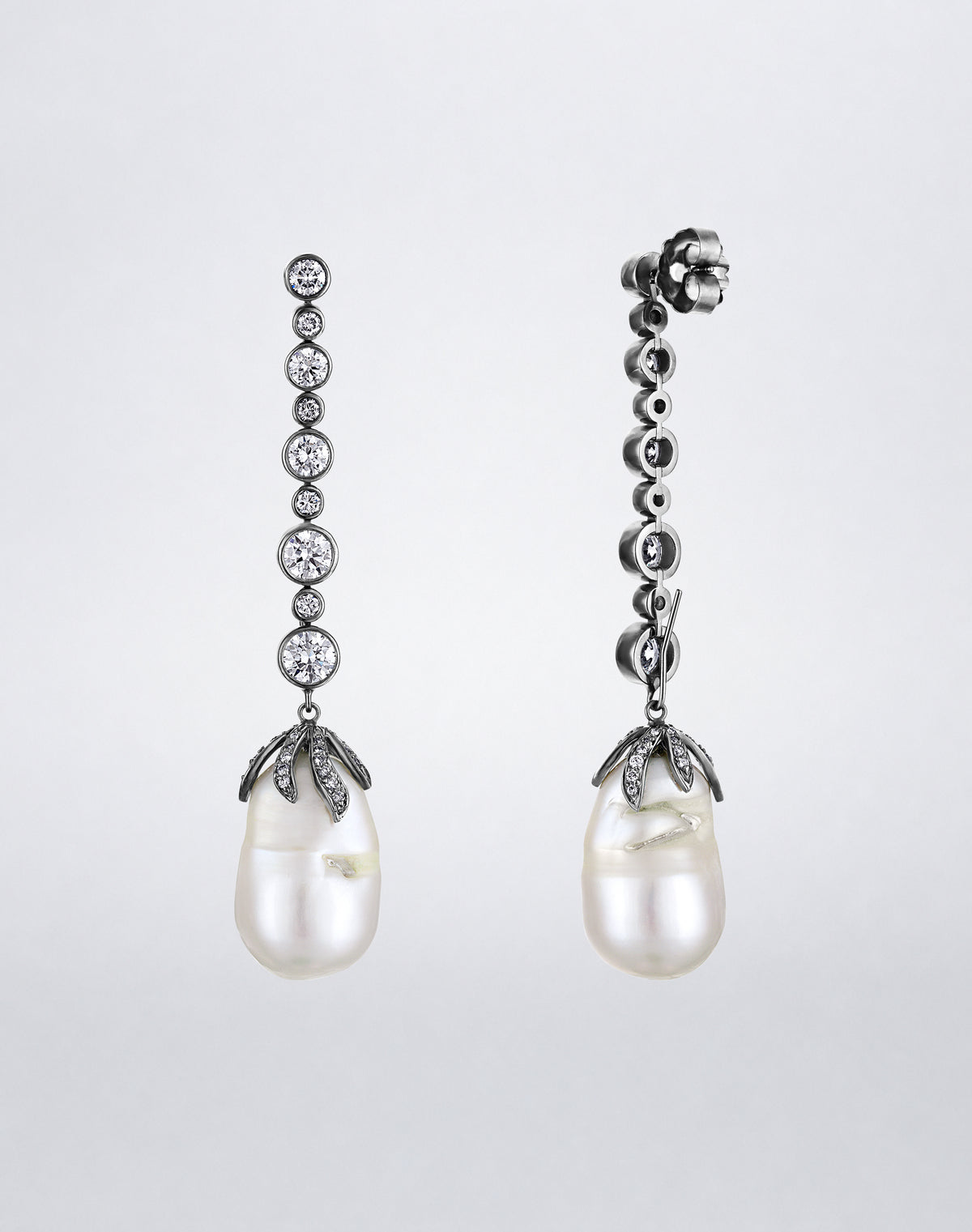 Side view of the Mindi Mond New York ICONS Freshwater Pearl Diamond Claw Earrings, highlighting the detachable pearl drops, sculptural diamond caps and graduated bezel-set diamond lines.