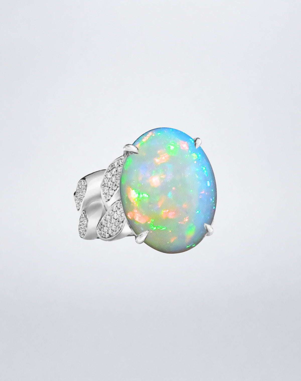 Mindi Mond New York Opal and Diamond Link Ring with a large oval opal and pavé diamond link band in 18K white gold.