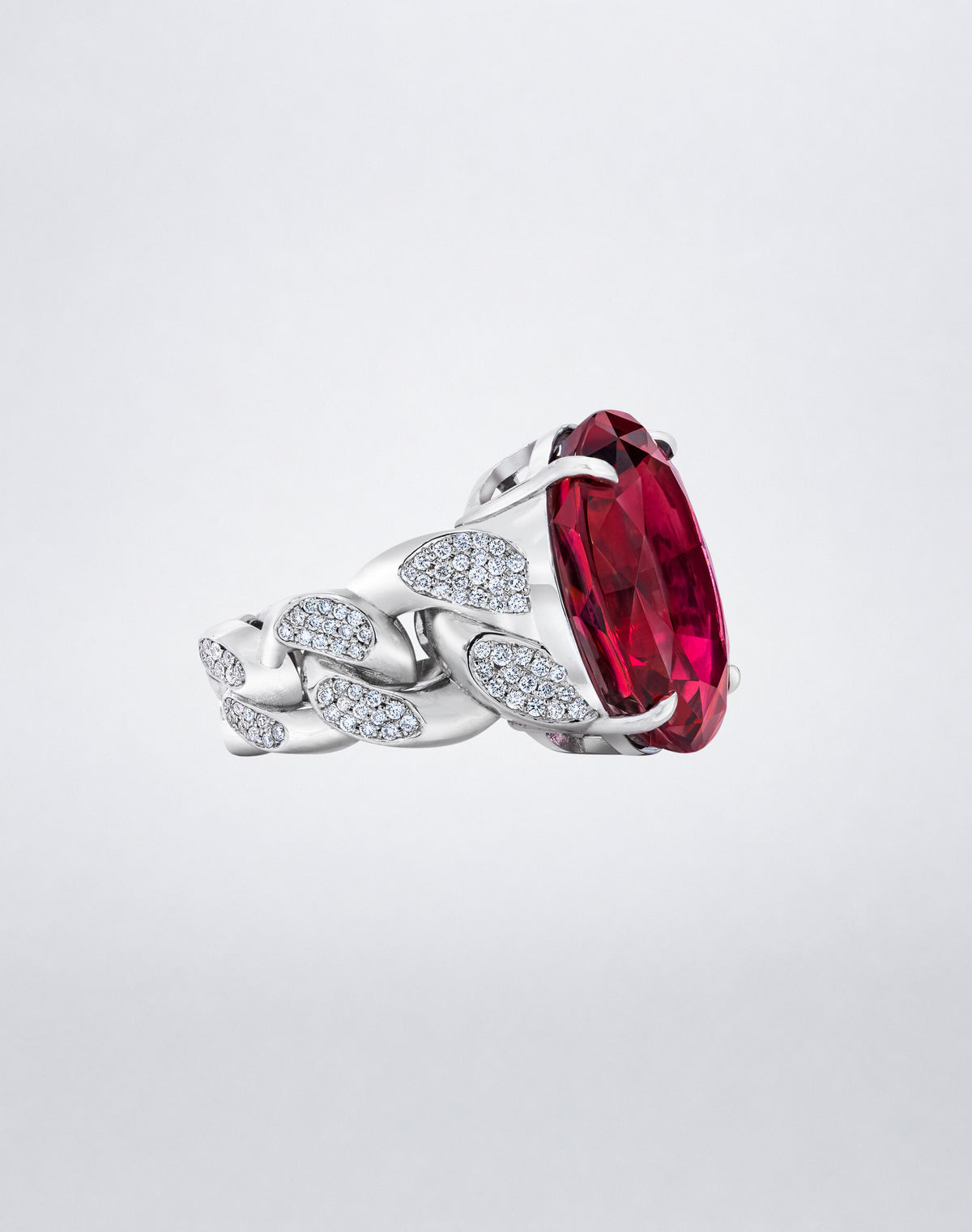 Mindi Mond New York Rubellite and Diamond Link Ring in 18K white gold, angled detail showing the rubellite and diamond-set link band.