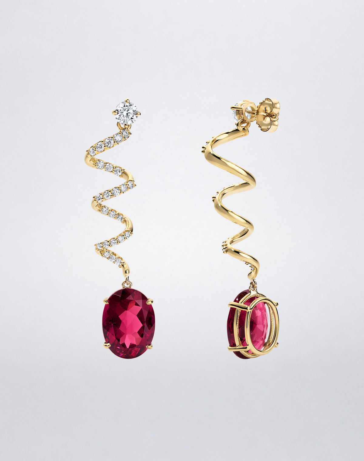 Back view of Mindi Mond New York ICONS Rubellite Diamond Spiral Earrings in 18K yellow gold, highlighting the sculptural spiral setting and post closure.