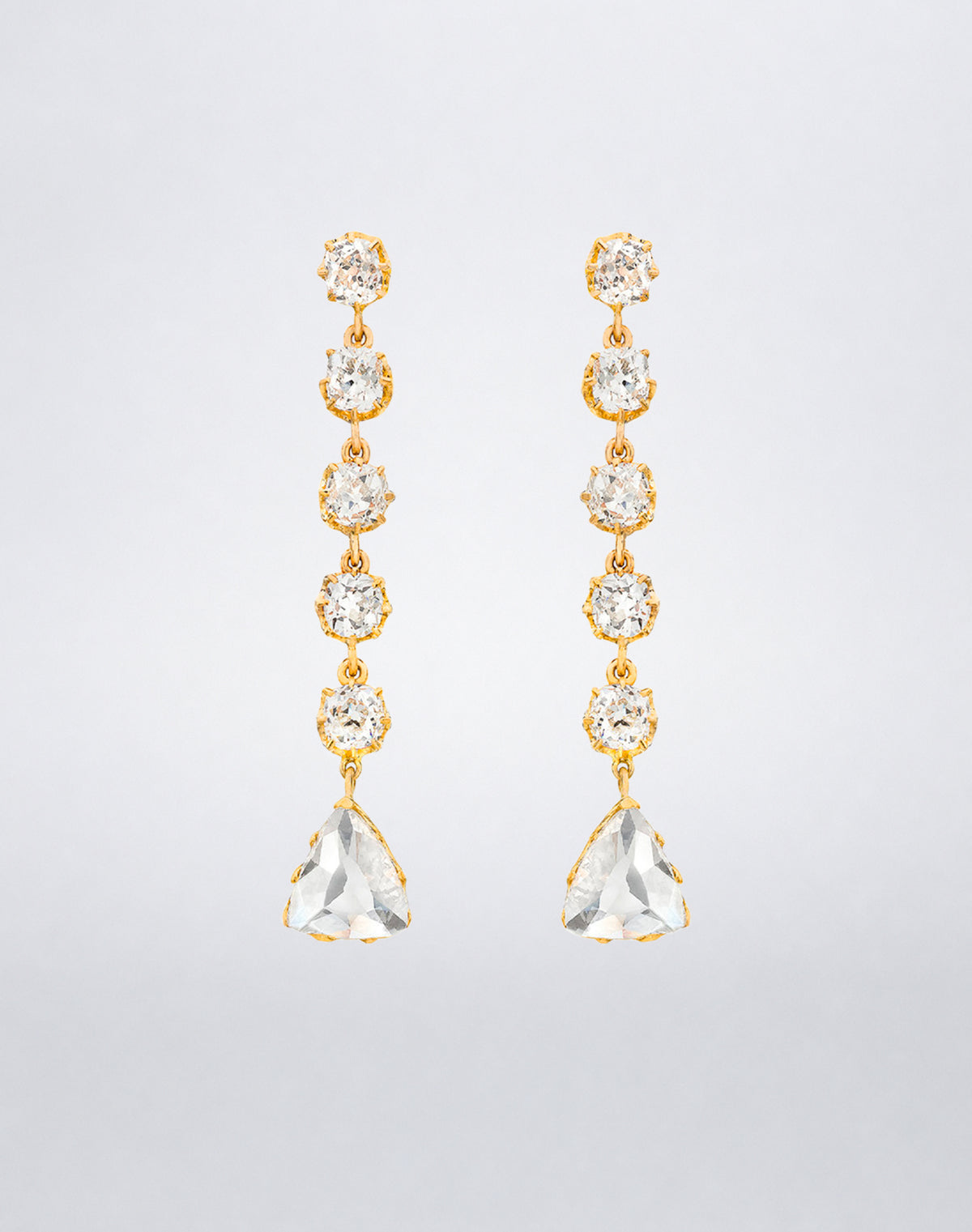 One-of-a-kind Diamond Trillion Earrings featuring five linked diamonds in yellow gold settings, each ending in a large trillion-cut diamond drop.