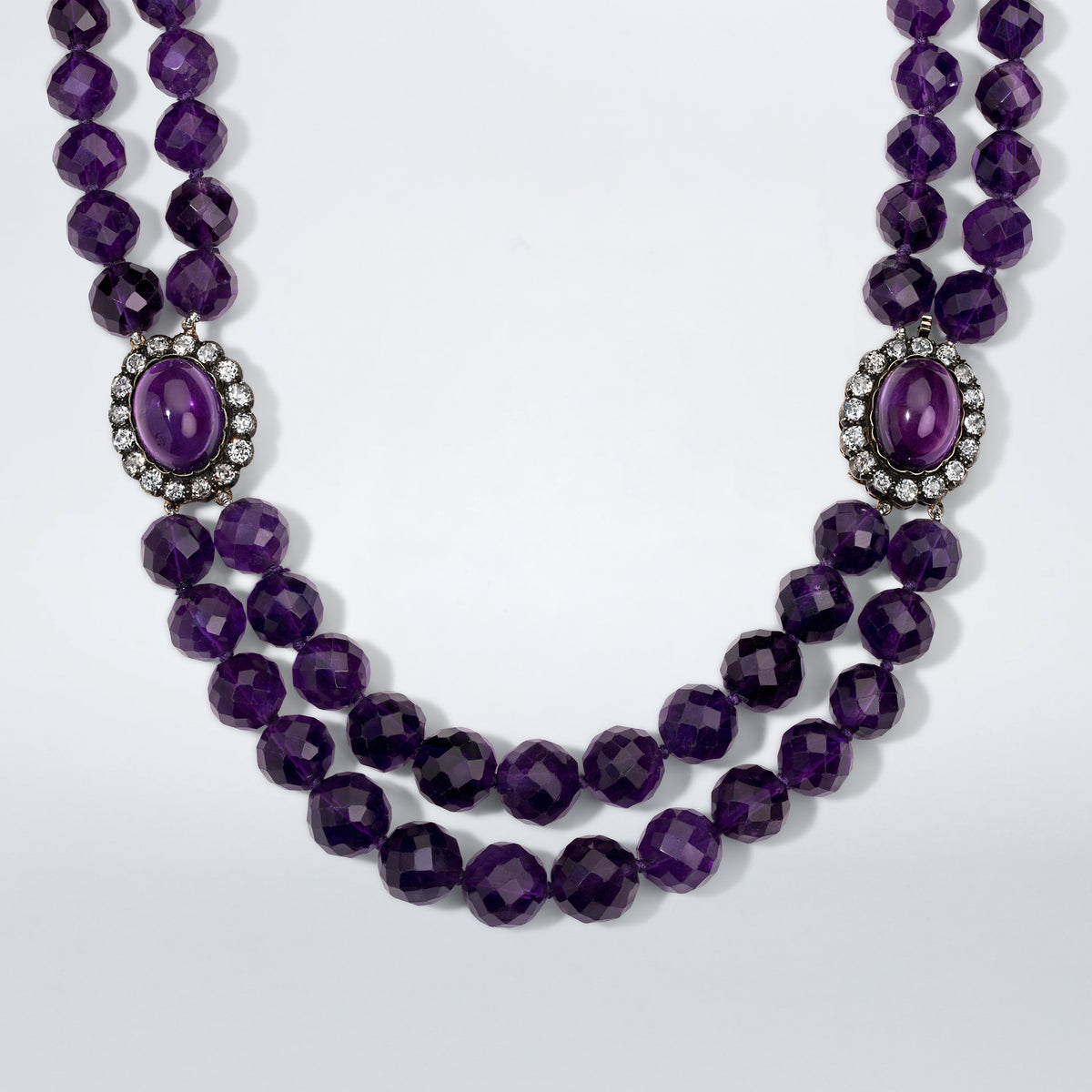 Mindi Mond New York double-strand amethyst necklace with oval cabochon amethysts framed by Old Mine cut diamonds, close-up