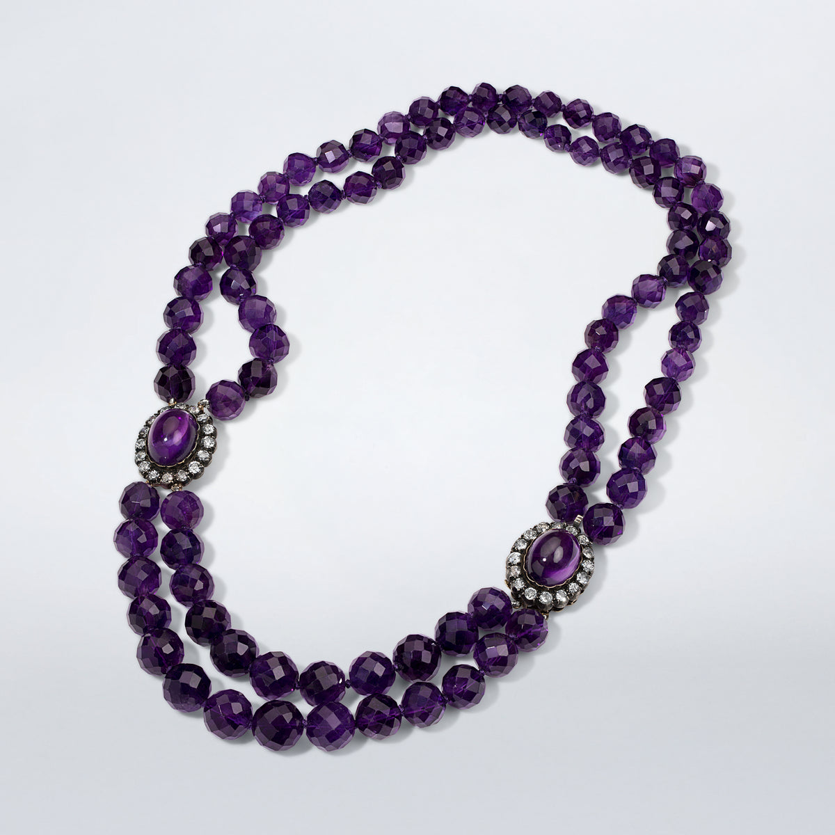 Mindi Mond New York double-strand purple amethyst beaded necklace with oval cabochon amethysts framed by Old Mine cut diamonds