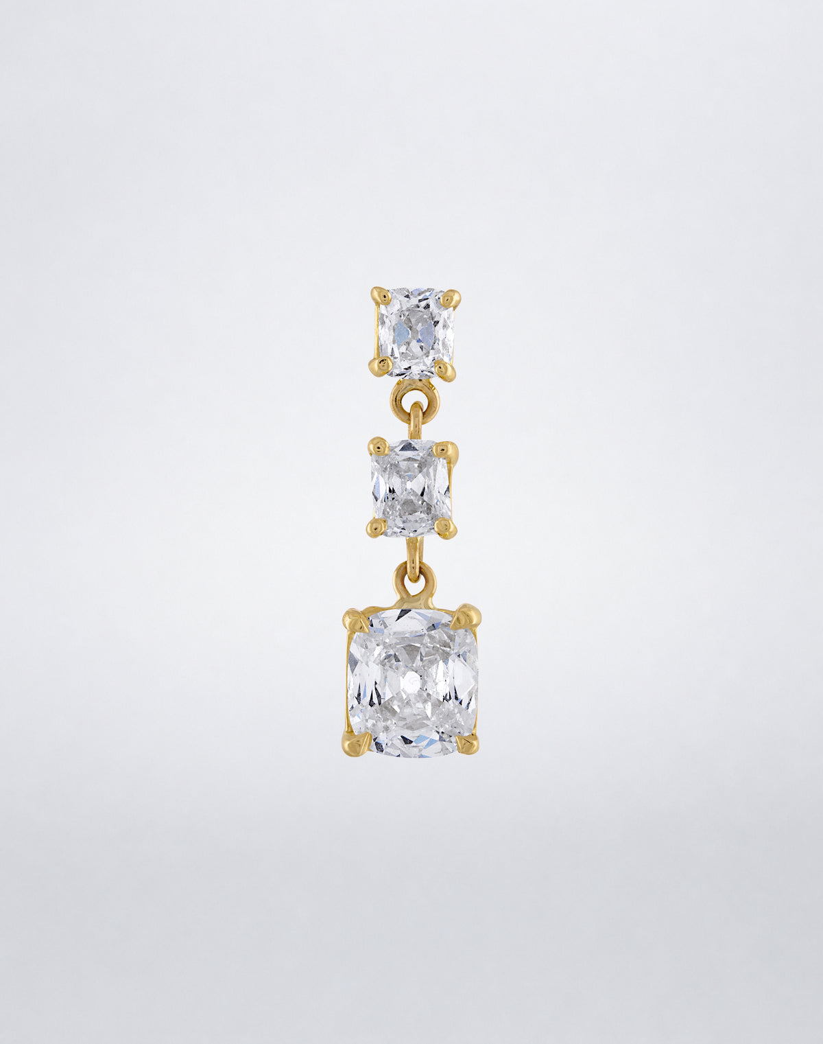 One-of-a-kind Old Cushion-Cut Single Earring featuring three graduated old cushion-cut diamonds linked in an articulated yellow gold drop.