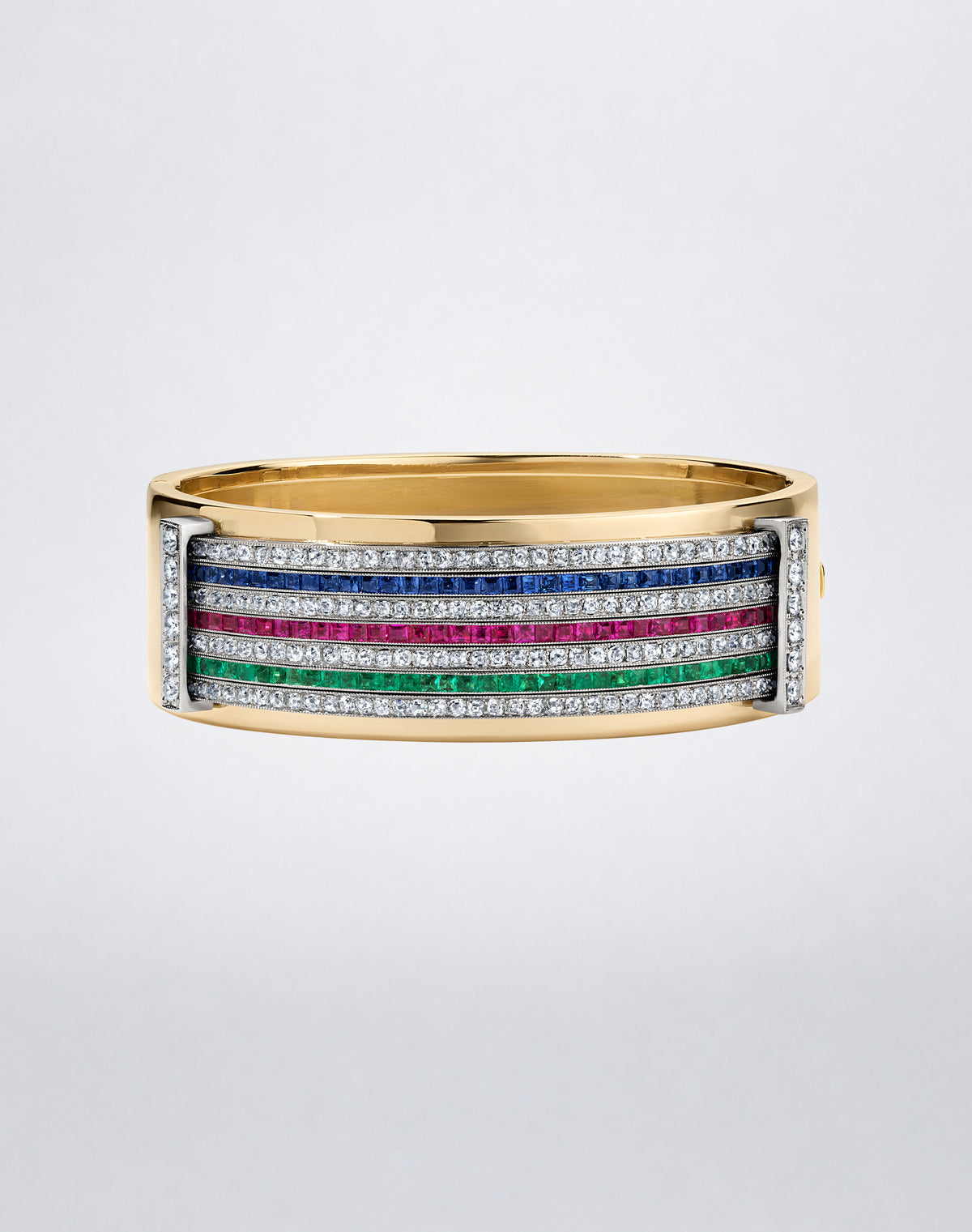 One-of-a-kind Mindi Mond New York RECONCEIVED wide gold bangle bracelet featuring five horizontal rows of pavé-set gemstones and diamonds.